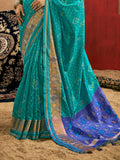 Bottle Green Patola Silk Saree With Blouse Piece