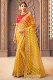 yellow organza saree