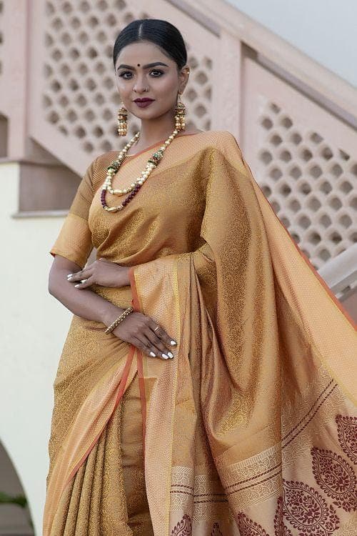 Ganga ~ the beige silk banarasi silk saree sets the stage for handcrafted  silver dots, while a resplendent gold border adds opulence. The… | Instagram