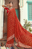 red bandhani saree