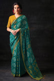 green brasso saree