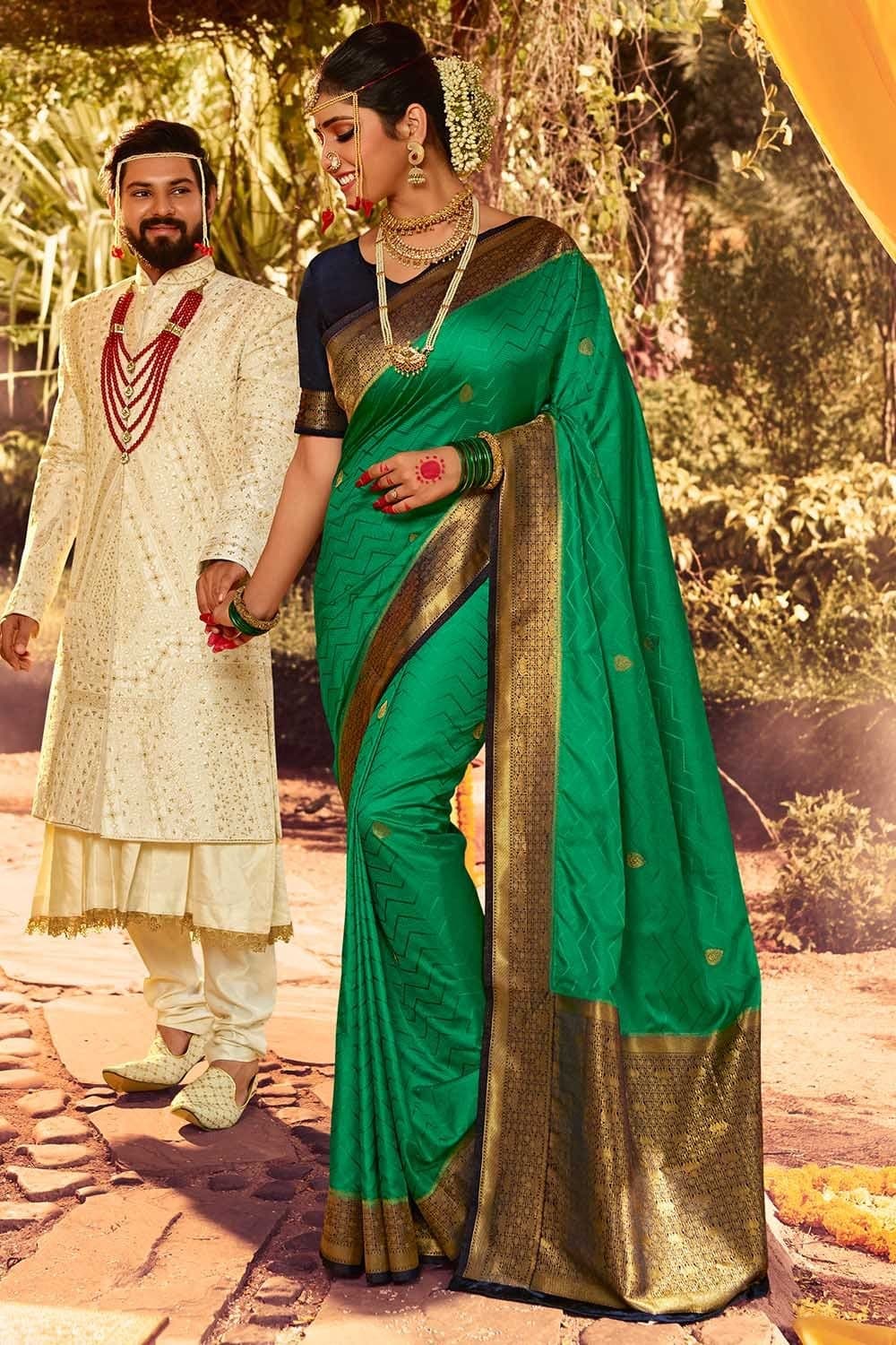 Photo of South Indian bride in an Olive Green saree for the Engagement