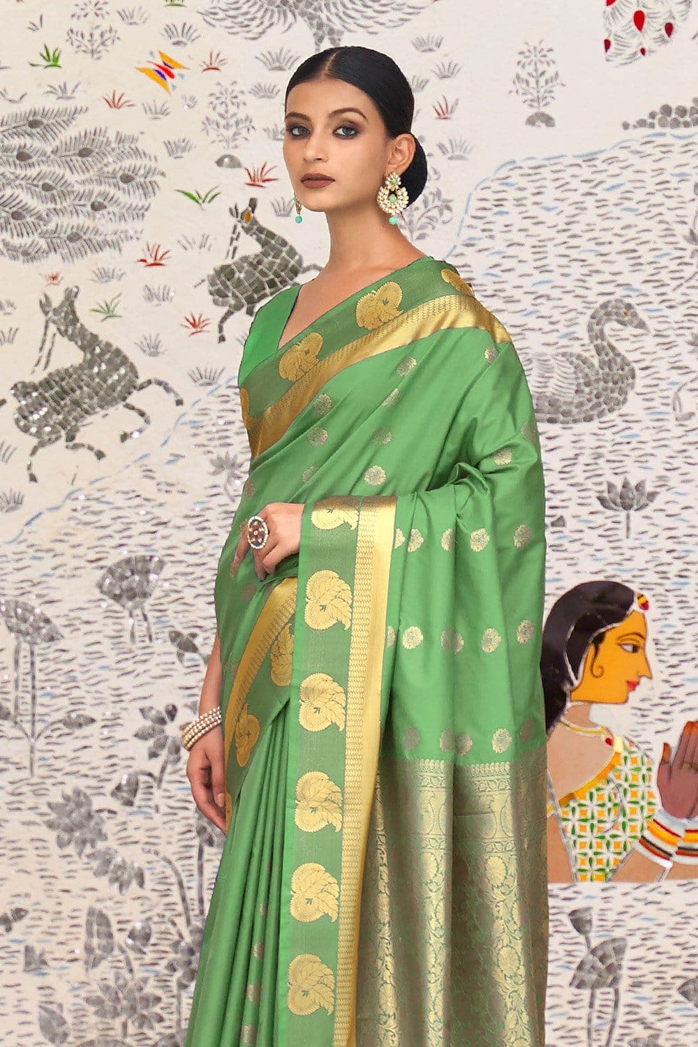 green kanjivaram saree