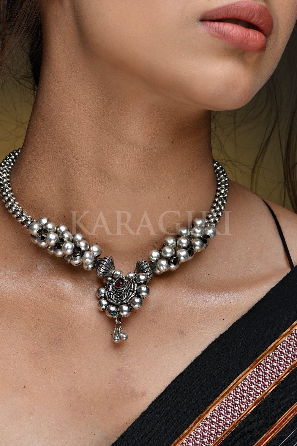 silver thusi necklace
