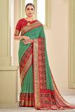 green patola saree