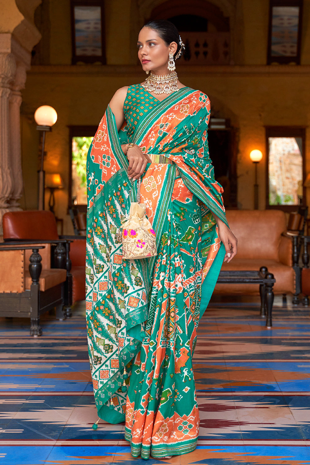 green patola saree