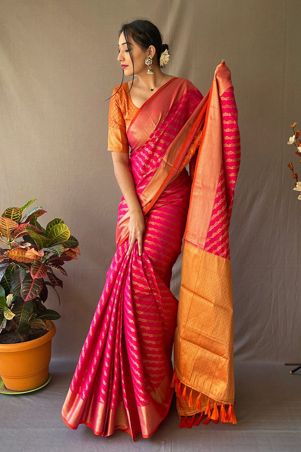 Pastel Orange and Deep Pink Designer Patola Saree